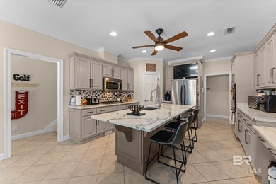 Nestled among mature trees and overlooking the 9th fairway, this - photo 5