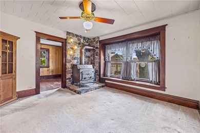 Discover the timeless charm of this 1900s home, rich with - photo 9
