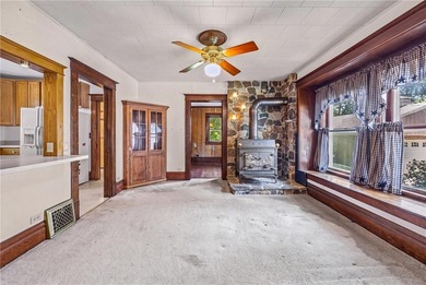 Discover the timeless charm of this 1900s home, rich with - photo 10