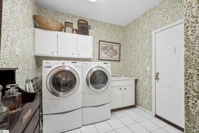 Gorgeous estate on over 8 acres featuring a pond, creek, and - photo 14