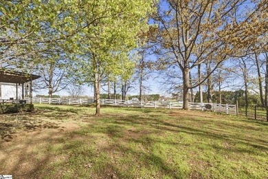 Gorgeous estate on over 8 acres featuring a pond, creek, and - photo 37