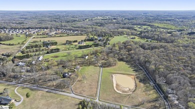 Gorgeous estate on over 8 acres featuring a pond, creek, and - photo 49