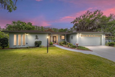 This classic WATERFRONT home is perfectly situated along the - photo 2
