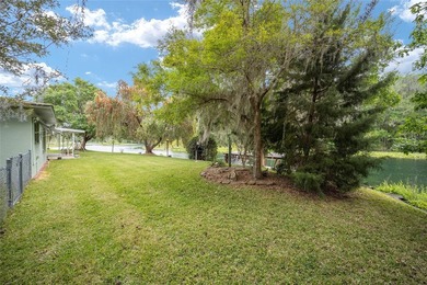 This classic WATERFRONT home is perfectly situated along the - photo 8