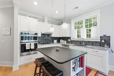Built in 2020 and tucked away on a premium end lot in a quiet - photo 18