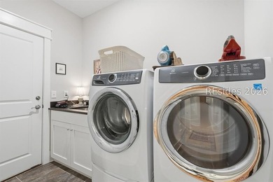 Built in 2020 and tucked away on a premium end lot in a quiet - photo 31