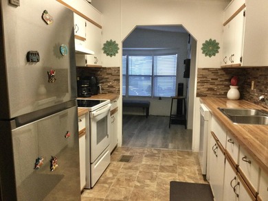 Meticulously maintained home in the much sought after Spanish - photo 14