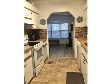 Meticulously maintained home in the much sought after Spanish - photo 15