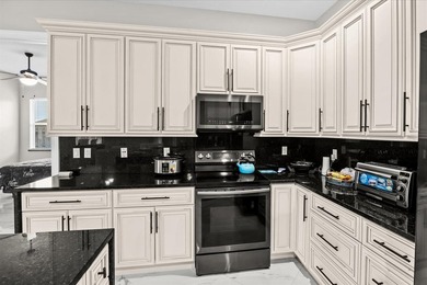 Welcome to this thoughtfully designed single-story residence in - photo 14