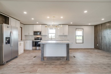 New Construction 5-bedroom, 3-bath home with a bonus room is - photo 7