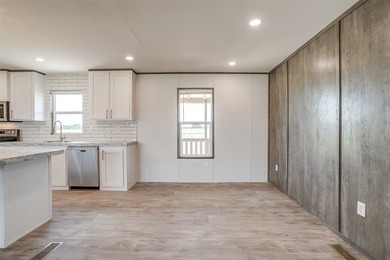 New Construction 5-bedroom, 3-bath home with a bonus room is - photo 8