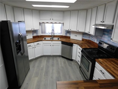 Welcome to Barefoot Bay! This home is conveniently located - photo 1