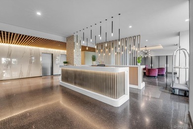 Experience Exceptional Living at the Americana at the Towers at - photo 5