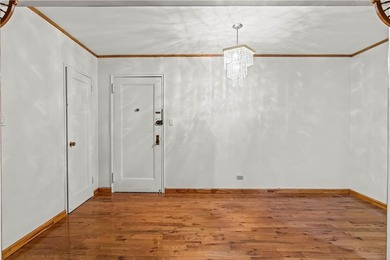 Welcome to 2465 Knapp Street #4F, a bright and beautifully lit