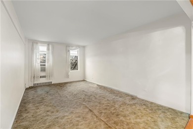 Welcome to 2465 Knapp Street #4F, a bright and beautifully lit