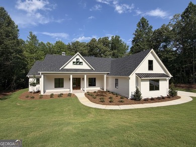 WELCOME TO FABULOUS NORTHSHORE AT LAKE REDWINE! THIS VERY - photo 1