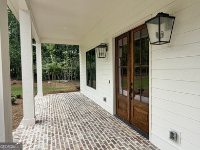 WELCOME TO FABULOUS NORTHSHORE AT LAKE REDWINE! THIS VERY - photo 4