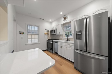Welcome to 3 Lido Pkwy - a charming and well-maintained home - photo 9