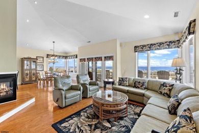 This spectacular 5 bedroom, 4 full bath, 2nd floor beachfront