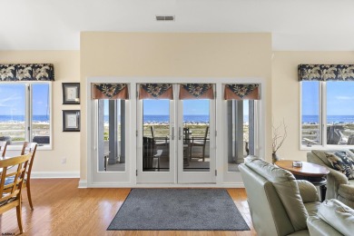 This spectacular 5 bedroom, 4 full bath, 2nd floor beachfront