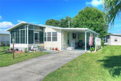 Welcome to this well-maintained east-facing home featuring an - photo 1