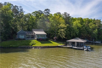 Located along the picturesque shores of Lake Harding, this - Lake Home For Sale in Valley, Alabama