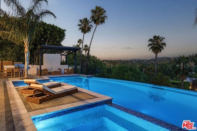 Set in the scenic hills of Encino, this brand-new construction - photo 1