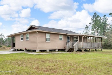 Lake Home For Sale in Saucier, Mississippi