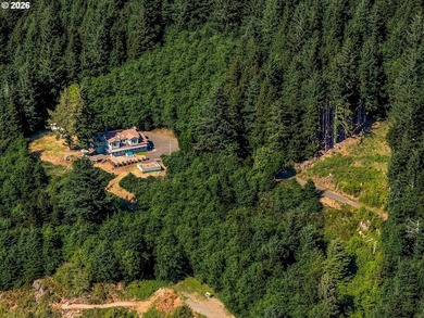 5.63 acres sits high above the Pacific in Cannon Beach and is - photo 27