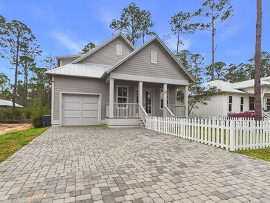 Discover coastal charm and modern luxury in this stunning Point - photo 1