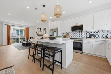 This home is a former model with an upgraded backsplash and - photo 11
