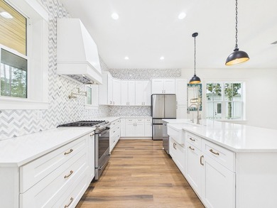 Discover coastal charm and modern luxury in this stunning Point - photo 8