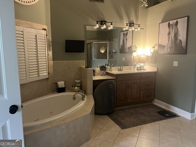 Meticulously maintained 5/4.5 bath Craftsman style home located - photo 19