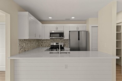 Lake front! This freshly updated condo offers a comfortable and - photo 9
