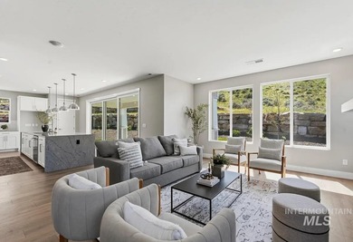 Set against the Eagle Foothills, this Shea Homes Symphony floor - photo 11