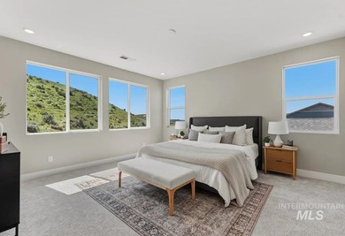Set against the Eagle Foothills, this Shea Homes Symphony floor - photo 12