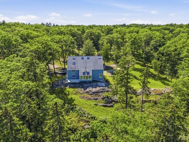 Nestled along the shore of the Kennebec River, this private 3BR - photo 23