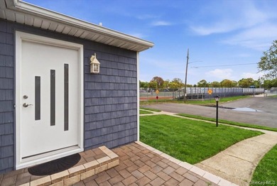 Beautifully renovated and move-in ready corner property located - photo 5