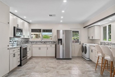 Experience island living at its finest with this beautifully - photo 16