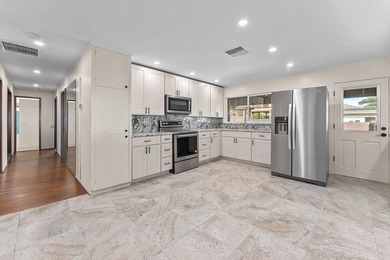 Experience island living at its finest with this beautifully - photo 18