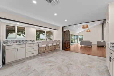 Experience island living at its finest with this beautifully - photo 19