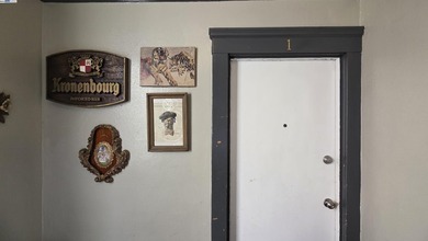 Three 1 bed apartments, an on site manager's office, a garage - photo 6