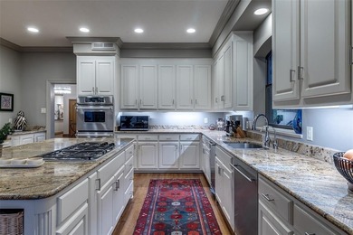 Rare lakeside retreat in the private 15-home enclave of