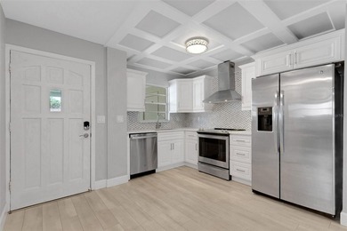 Enjoy this beautifully updated 2-bedroom, 2-bath end unit/corner - photo 3
