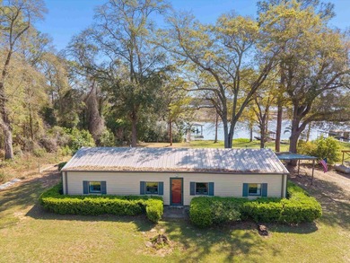 Welcome home to easy lakeside living! Steel construction with - photo 4