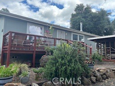 Discover this charming two-bedroom, two-bath manufactured home - photo 1