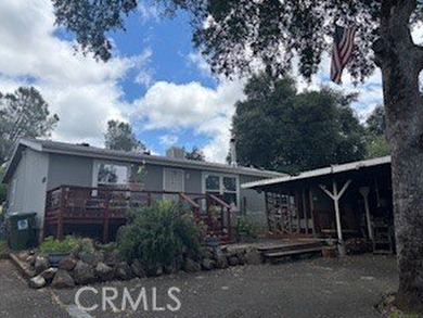 Discover this charming two-bedroom, two-bath manufactured home - photo 2