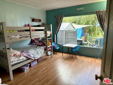 Spacious and rare 4-bedroom, 2-bath double-wide located in the - photo 12
