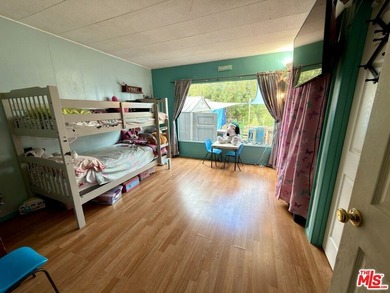 Spacious and rare 4-bedroom, 2-bath double-wide located in the - photo 13