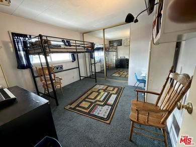 Spacious and rare 4-bedroom, 2-bath double-wide located in the - photo 15
